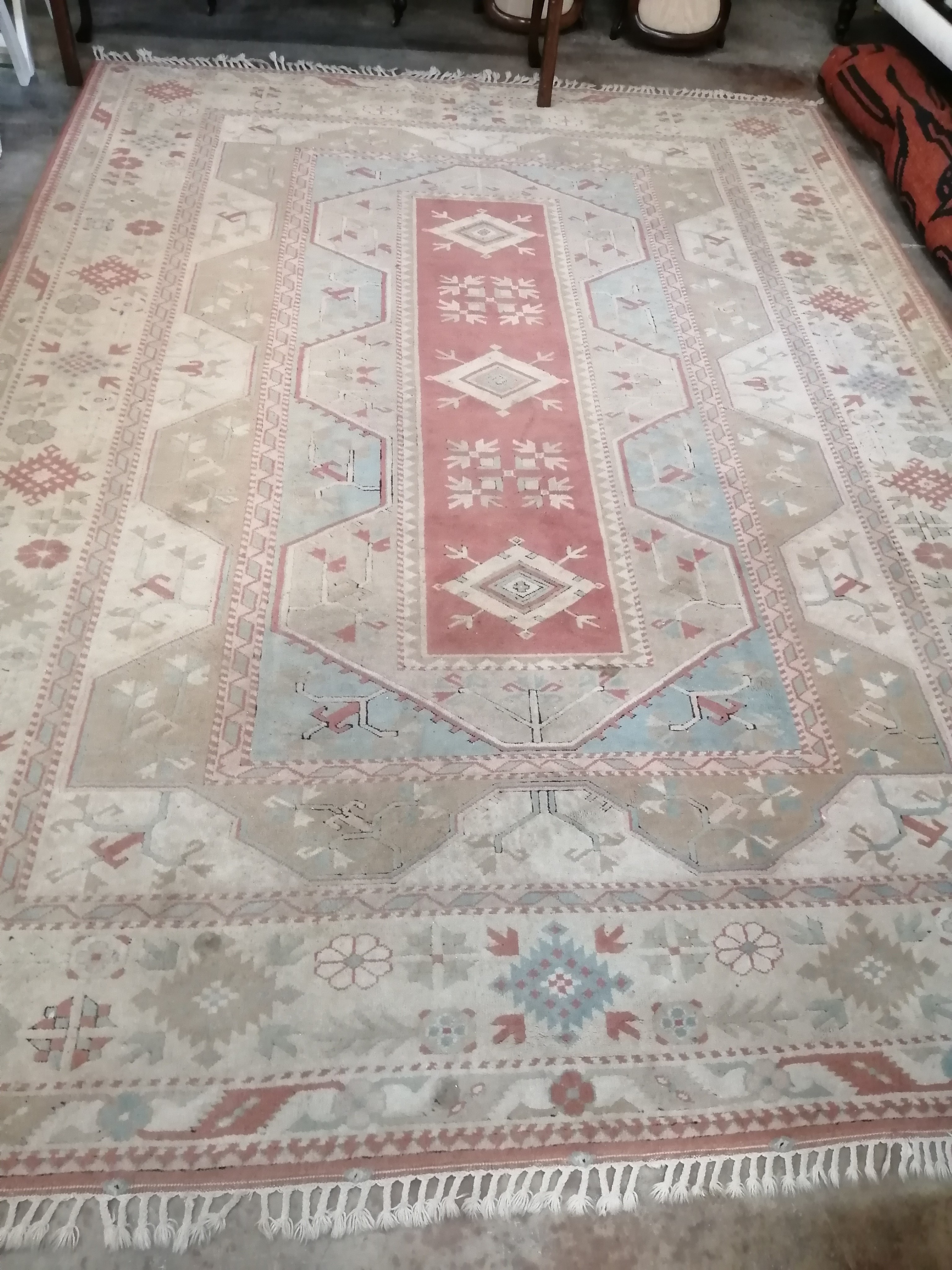 A Caucasian style polychrome geometric carpet, 360 x 260cm
